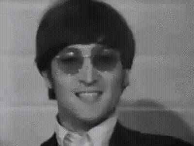Black And White Man In Suit, Tie, And Sunglasses GIF