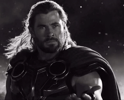 Black And White Man In Superhero Costume GIF