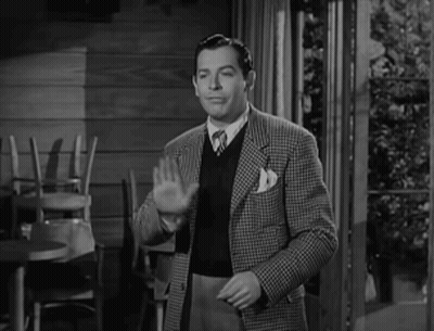 Black And White Man In Vest And Jacket GIF