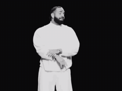Black and White Man in White Shirt and Pants