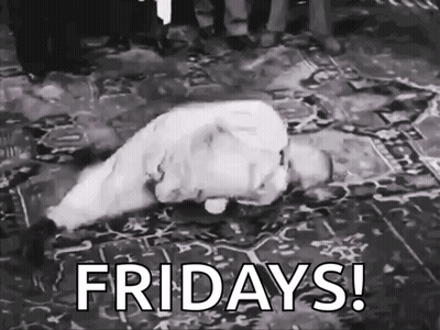 Black And White Man Laying On Floor Fridays GIF