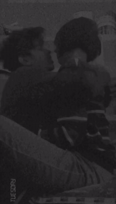 Black And White Man Lying On Bed GIF