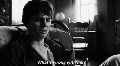 Black And White Man On Couch Saying What's Wrong With Me GIF