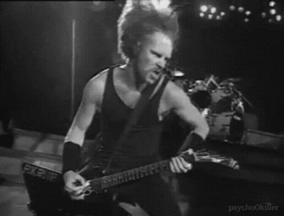 Black And White Man Playing Guitar On Stage GIF
