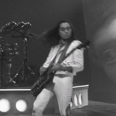 Black And White Man Playing Guitar On Stage GIF
