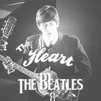 Black and White Man Playing Guitar The Heart of the Beatles