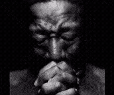 Black And White Man Praying With Folded Hands GIF
