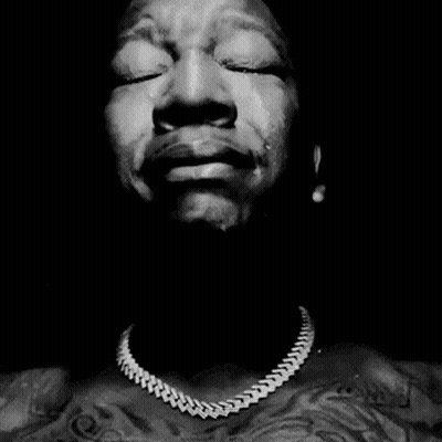 Black And White Man Praying With Folded Hands GIF
