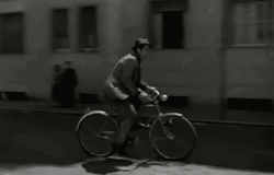 Black And White Man Riding Cycle GIF