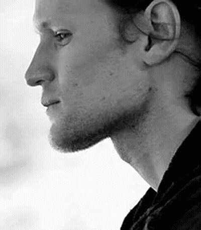 Black And White Man's Face With Beard And Ear GIF