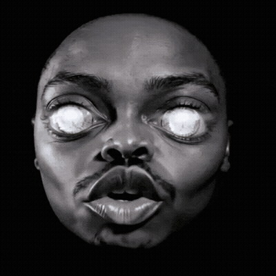 Black And White Man's Face With Glowing Eyes GIF
