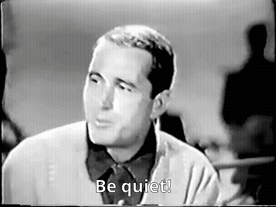 Black And White Man Saying Be Quiet GIF