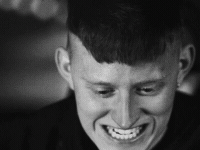 Black And White Man Smiling With Open Mouth GIF