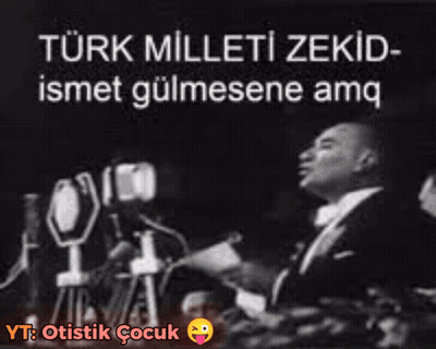 Black And White Man Speaking Into Microphone With Turk Milleti Zekid GIF