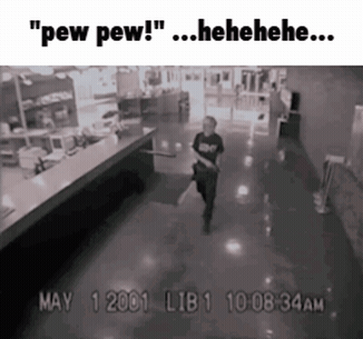 Black And White Man Walking Down Hallway GIF