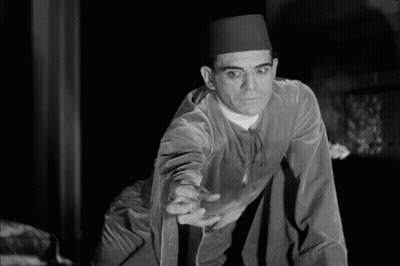 Black And White Man Wearing Fez GIF