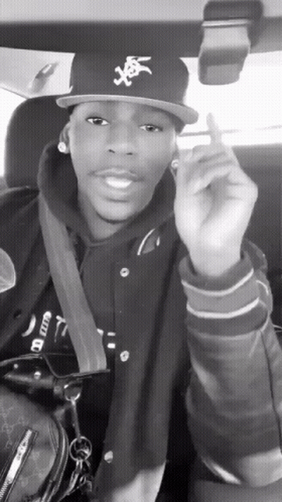 Black and White Man Wearing Hat Saying A