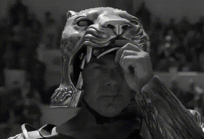 Black And White Man Wearing Lion Helmet GIF