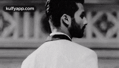 Black And White Man With Beard Wearing Earbuds GIF