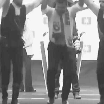 Black And White Man With C3 Logo On Chest GIF