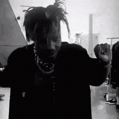 Black And White Man With Dreadlocks And Necklace GIF