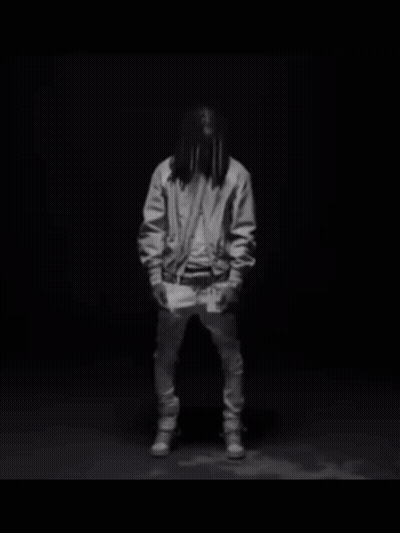 Black And White Man With Dreadlocks In Jacket GIF
