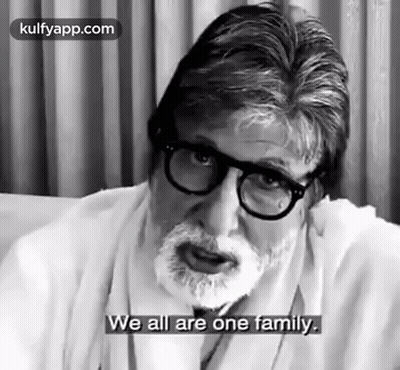 Black And White Man With Glasses And Beard Saying We All Are One Family GIF