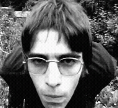 Black And White Man With Glasses And Black Jacket GIF