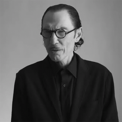 Black And White Man With Glasses And Black Shirt GIF