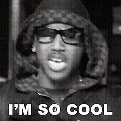 Black and White Man With Glasses and Hooded Jacket