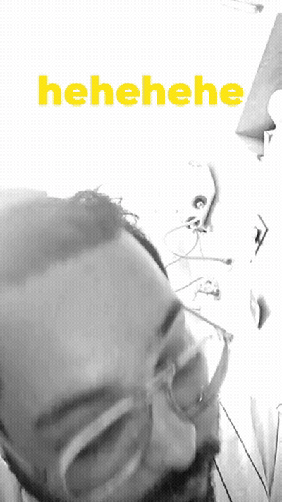 Black And White Man With Glasses And Yellow Henehene GIF