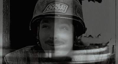 Black And White Man With Helmet Saying Cold Exion GIF