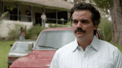 Black And White Man With Mustache In Striped Shirt GIF