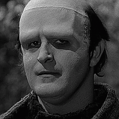 Black And White Man With Scar On Forehead GIF