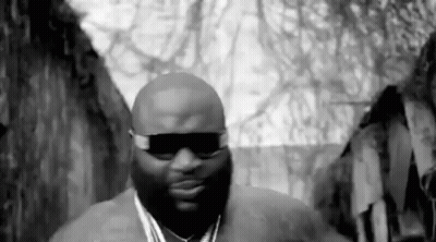 Black And White Man With Sunglasses And Medallion GIF