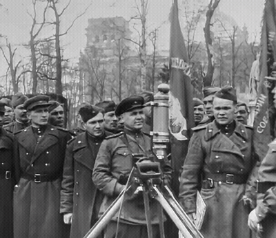 Black and White Men Holding CCCP Flags