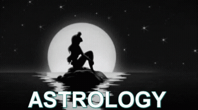 Black And White Mermaid Sitting On Rock With Astrology GIF