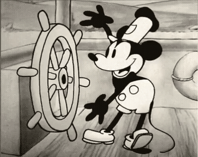 Black And White Mickey Mouse With Steering Wheel GIF