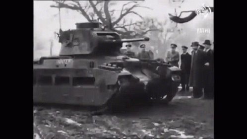 Black And White Military Tank In Field GIF