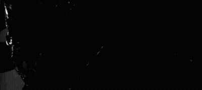 Black And White Monster With Sharp Teeth And Large Mouth GIF