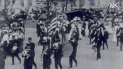Black And White Parade With Olympics Logo GIF