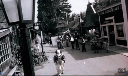 Black And White People Walking Past The News Art Gallery GIF
