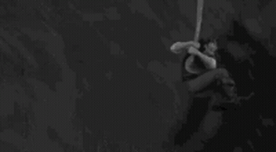 Black And White Person Holding Sword GIF
