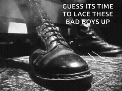Black And White Person In Black Boots Saying Guess Its Time To Lace These Bad Boys GIF