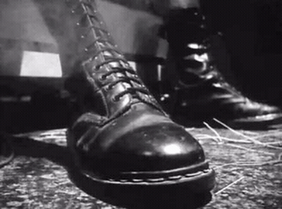 Black And White Person In Combat Boots GIF