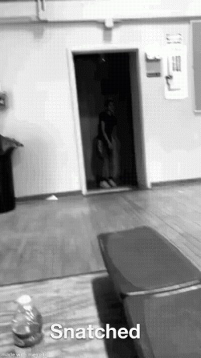 Black And White Person In Doorway Snatched GIF