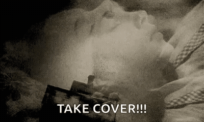 Black And White Person Lying In Bed Take Cover GIF