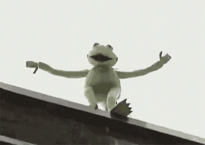 Black And White Person Standing Next To Table GIF