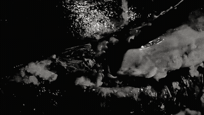 Black And White Person Swimming GIF