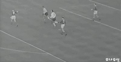 Black And White Person Walking On Sidewalk GIF